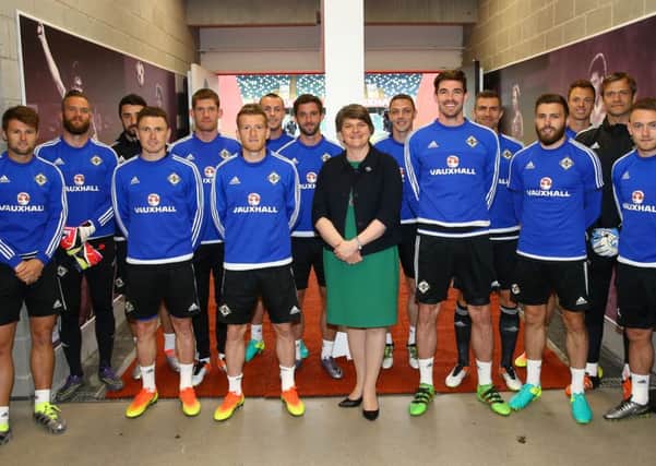 Press Eye - Belfast - Northern Ireland - 26th May 2016 - 

Photo By William Cherry / Press Eye.

First Minister Arlene Foster dropped in on the Northern Ireland team's final training session for their match against Belarus at Windsor Park this afternoon. The First Minister posed for a team picture with Michael O'Neill's squad and passed on her best wishes for this summer's Euro 2016 tournament, before they head off to Austria for a week-long training camp next week.