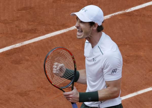 Andy Murray celebrates winning in Paris