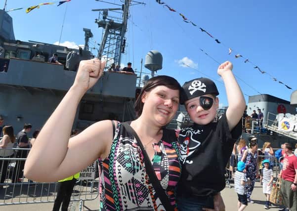 The Belfast Titanic Maritime Festival 2016 at the Titanic Quarter on Monday. Pictured enjoying the weather Emma and Rory Murry from Dundonald.
Picture: Arthur Allison/ Pacemaker Press