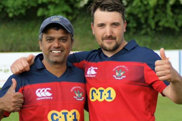 Kaushik Aphale and Craig Lewis celebrate their brilliant hundreds for Derriaghy against Donemana. The Queensway men are awaiting the last eight draw