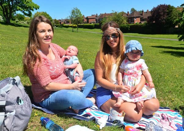Sinead Laverty , Fiadh Dunlop, aged one, and Paula Fitzsimons with baby Lorcan Maguire enjoy the sunshine at Belfast Castle. 
Picture By: Arthur Allison/ Pacemaker Press