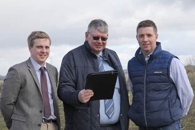 Discussing the itinerary for Holstein NI's five-day trip to the European Holstein Show in Colmar, are, from left: Stephen Agnew, Devenish Nutrition; club secretary John Martin; and chairman John Berry.