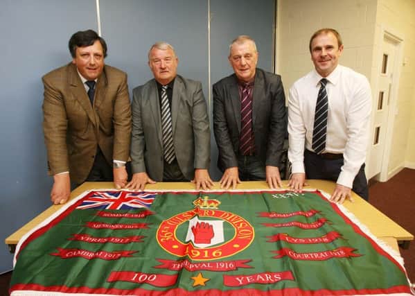 Loyalist Communities Council member David Campbell (left) at the launch of the flag with Jim Wilson, Jackie McDonald and Winston Irvine