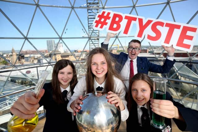 Illusionist David Meade joined students, from left, Ellen McAuley, Rachel Brown and Susanna Crabbe from Ballymena Academy in the dome at Victoria Square to launch the 2017 BT Young Scientist & Technology Exhibition