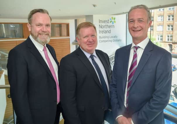 Bill Scott of Invest, centre, with John Roddy, left, and Barry McLean, Codec-dss