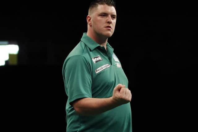 Daryl Gurney celebrates his win over Ireland. Pic Lawrence Lustig/PDC