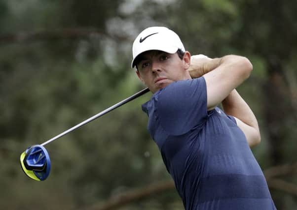 Rory McIlroywatches his tee shot on the second hole during the third round of the Memorial golf tournament