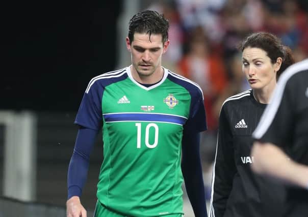 Kyle Lafferty limped off with a calf injury