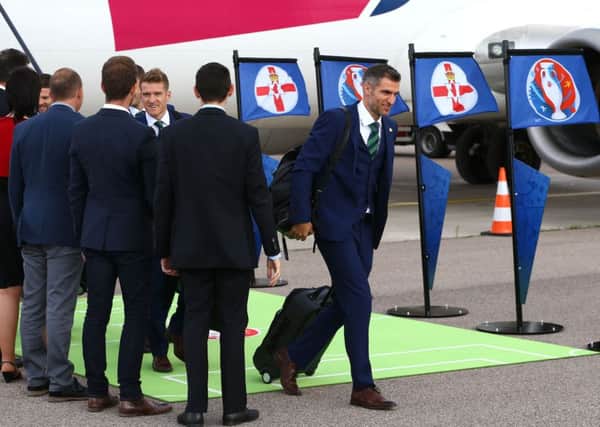 Aaron Hughes and his team-mates touched down in France on Sunday