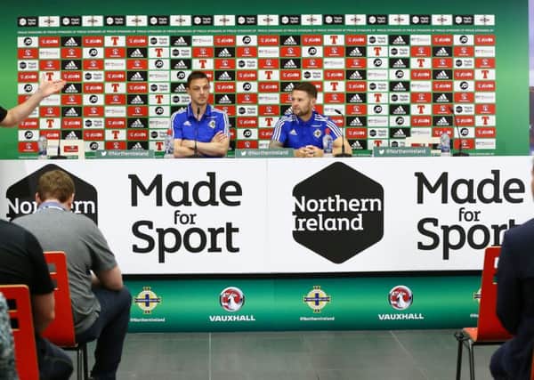Northern Ireland's Chris Baird and Oliver Norwood at a press conference in the Media Centre in France