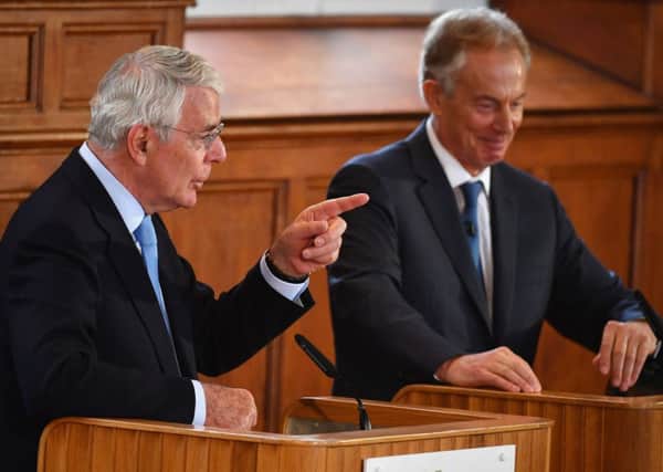 Former prime ministers Sir John Major (left) and Tony Blair share a platform for the Remain campaign event at the University of Ulster in Londonderry. Photo: Jeff J Mitchell/PA Wire