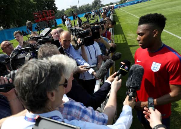 England's Daniel Sturridge speaks with the media during a training session at Stade de Bourgognes
