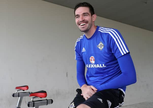 Kyle Lafferty trains on an exercise bike