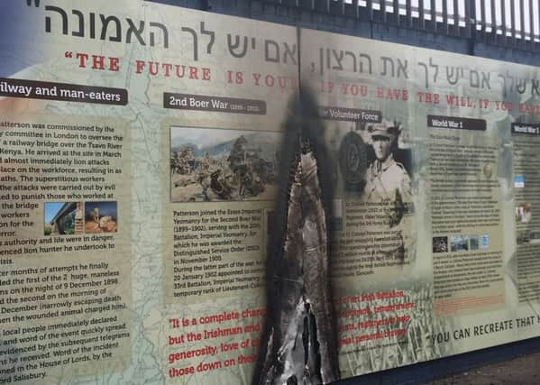 The charred Jewish war memorial at Northumberland Street off the Shankill Road in Belfast