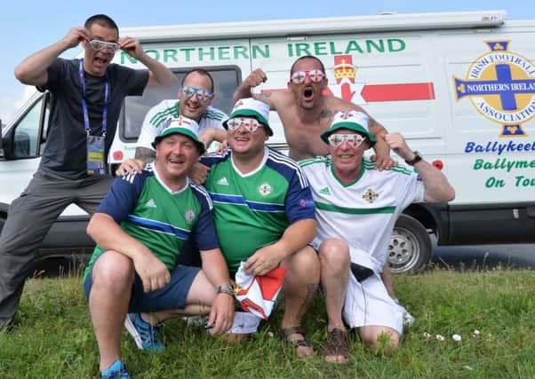 Pacemaker Press 9/6/2016 
A Local meets with  Northern Ireland Fans Ian Thompson, George McFall , Russell Bridgett , Darren McDonald and Eddie McCullough   from Ballymena travel threw St Georges de Reneines  in a camper van, on the way to Nice as N Ireland face Poland in their opening match on Sunday.
Pic Colm Lenaghan/Pacemaker