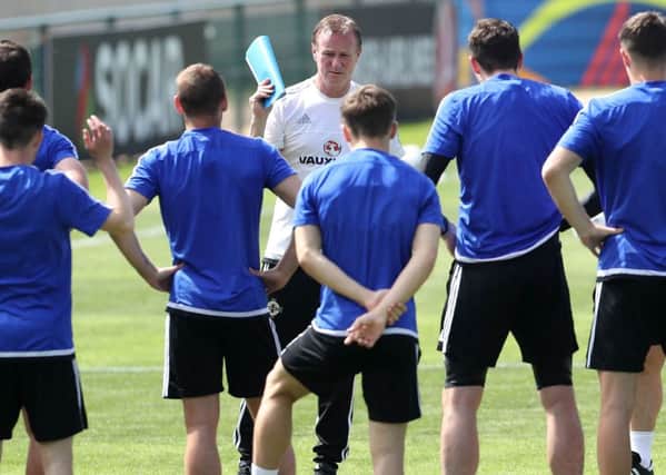 Michael O'Neill pictured during a training session in St Georges de Reneins, France ahead of their opening Euro 2016 game against Poland on Sunday