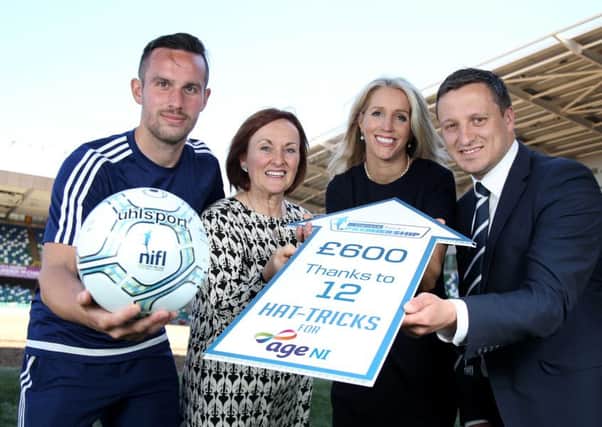 Pictured at Windsor Park are Andy Waterworth of Linfield Football Club; Siobhan Casey, Director of Marketing & Business Development at Age NI; Nicola McCleery, Head of Marketing for Danske Bank and Andrew Johnston, NI Football League Managing Director.