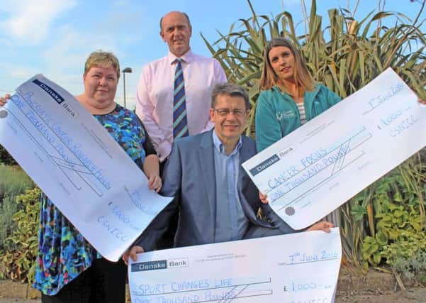 Pictured at the presentation are (left to right): Susan Cooke, Pancreatic Cancer Research Fund, Ivan McMinn, Club Chairman, Gareth Maguire, Sport Changes Life and Emma McArdle, Cancer Focus