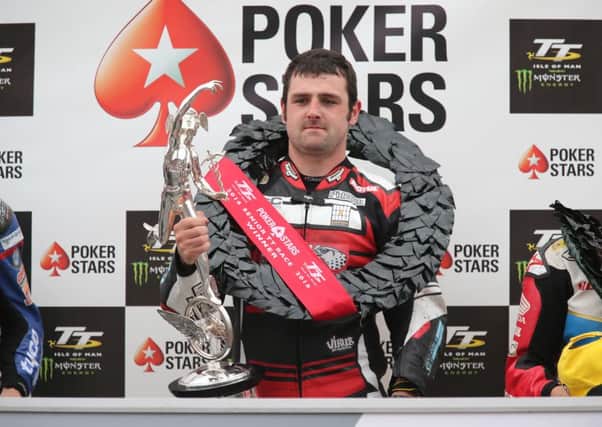 Michael Dunlop with the legendary Senior TT trophy - the biggest prize in motorcycle road racing.