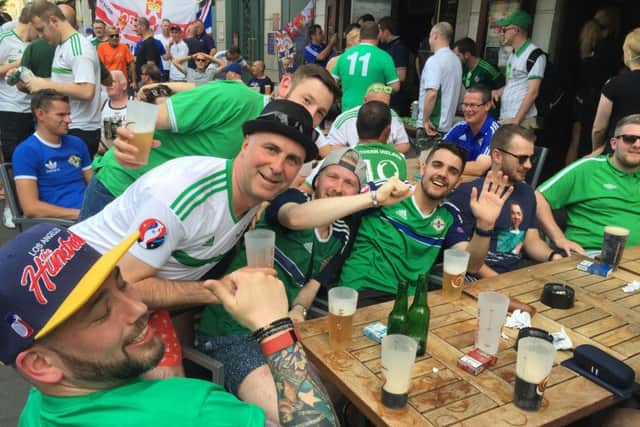 Northern Ireland supporter and Groom Stuart Stockman (second left) outside the Ma Nolan's Irish pub in Nice, France ahead of his team's opening match against Poland in Euro 2016