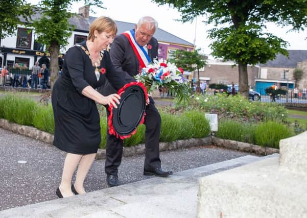The Mayor of Ards and North Down Council, Deborah Girvan, and Thiepval Mayor Max Potie lay wreaths at the war memorial in Newtownards