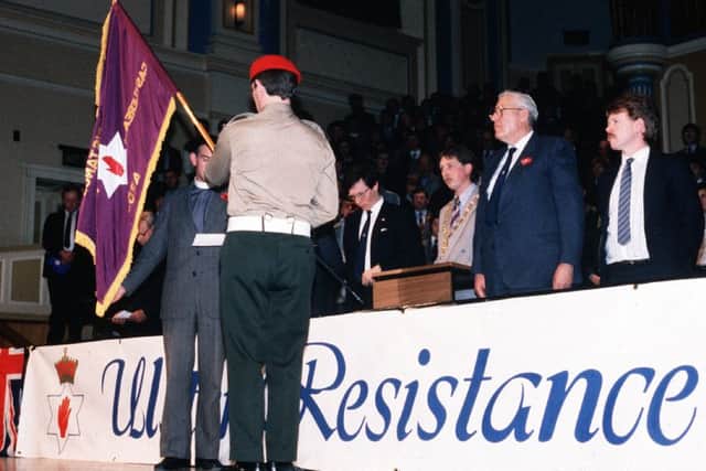 Peter Robinson, Sammy Wilson and Ian Paisley at the Ulster Hall rally which launched Ulster Resistance in November 1986