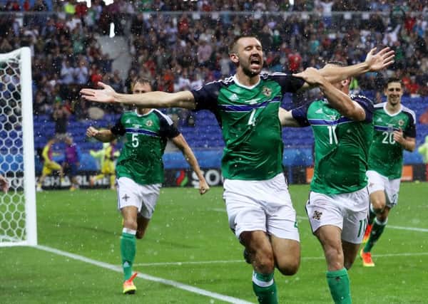 Northern Irelands Gareth McAuley celebrates his goal against Ukraine