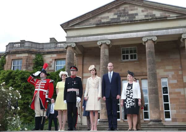 The Duke and Duchess and Theresa Villiers' (second left) and other dignitaries before descending into the garden party at Hillsborough Castle. Photo: Brian Lawless/PA Wire