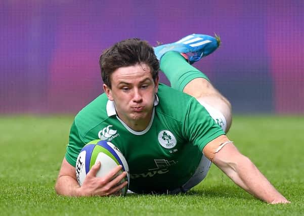 Ireland's Hugo Keenan scores his team's first try