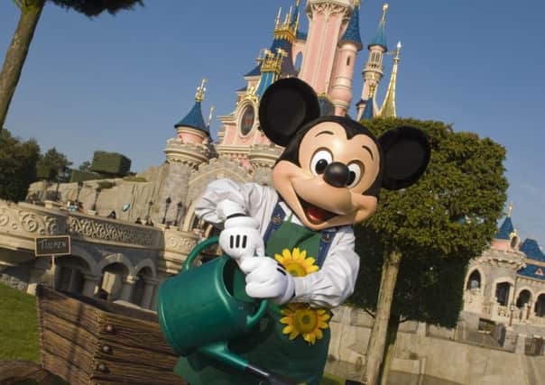 Photo of Mickey in Disneyland Gardens