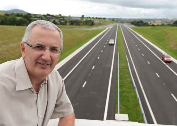 Danny Kennedy MLA, who was formerly Transport minister, overlooking the then newrly opened A1 Dual Carriageway on the outskirts of Newry. Europe has helped fund road schemes, he says