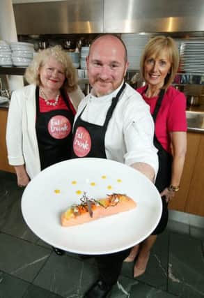 Niall McKenna with Michele Shirlow, left, and Anne McMullan of Visit Belfast