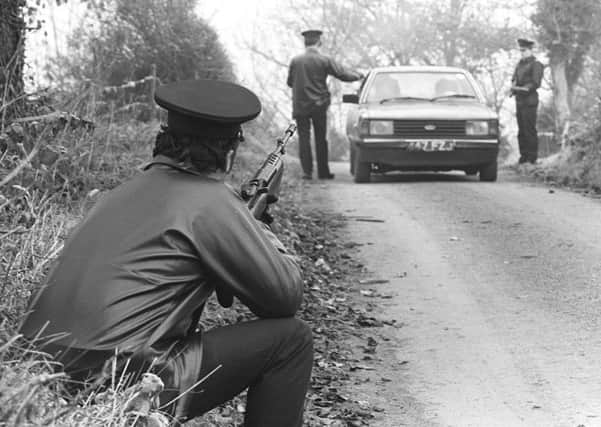 RUC patrol in the Border Area in search of Dominic McGlinchey. The unit known as DMSU.  Pacemaker Press Intl. 23/11/83.

986/83/BW