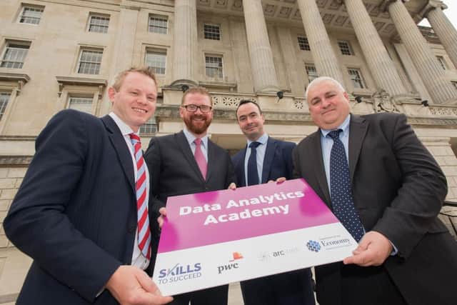 Economy Minister Simon Hamilton with, from left, Steven Millar and Pat Beattie, PwC, and Brendan Crossey of arc-net