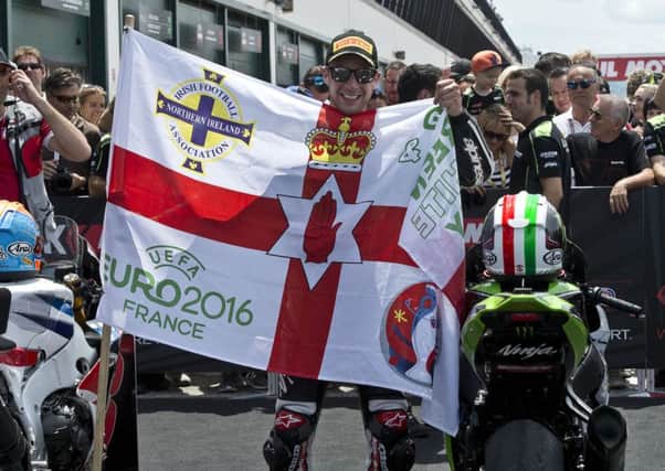 World Superbike champion Jonathan Rea celebrates at Misano in Italy.