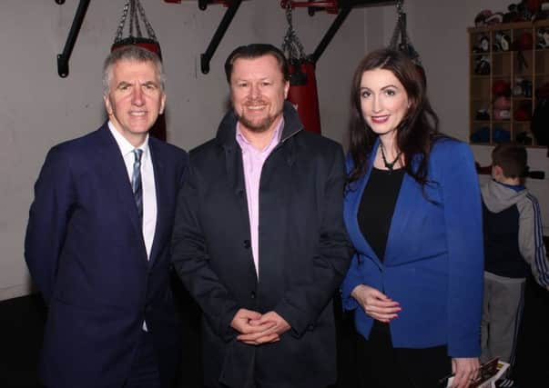 Mairtin O'Muilleoir  and Emma Pengelly with sponsor Terry Ace from the Ormeau Credit Union at the Ormeau Boxing Club