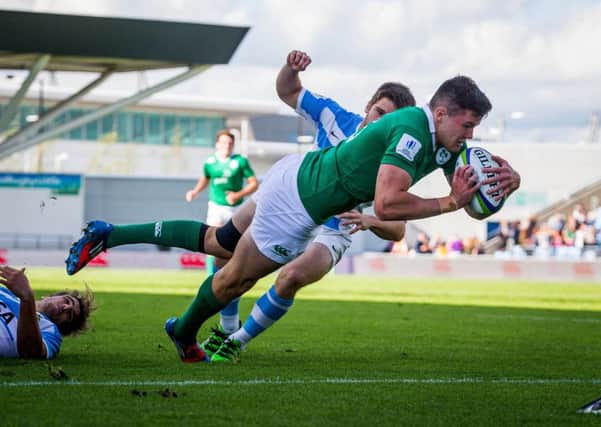 Jacob Stockdale scores one of his two tries for Ireland against Argentina