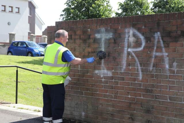 Graffitti at Ballygomartin church this morning in west Belfast.