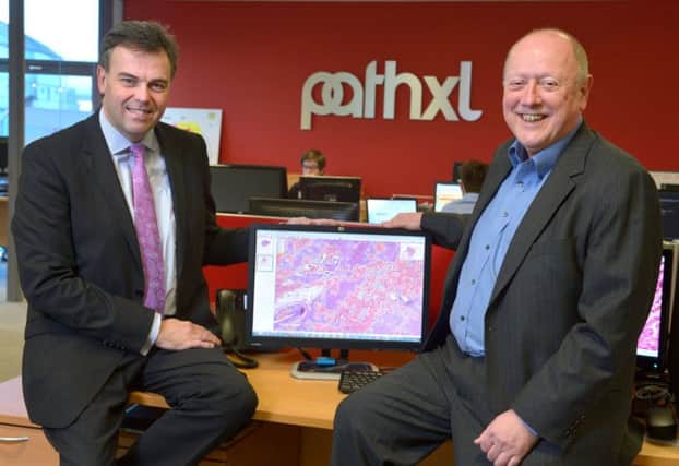 PathXL CEO Des Speed, right, with Invest chief executive Alastair Hamilton