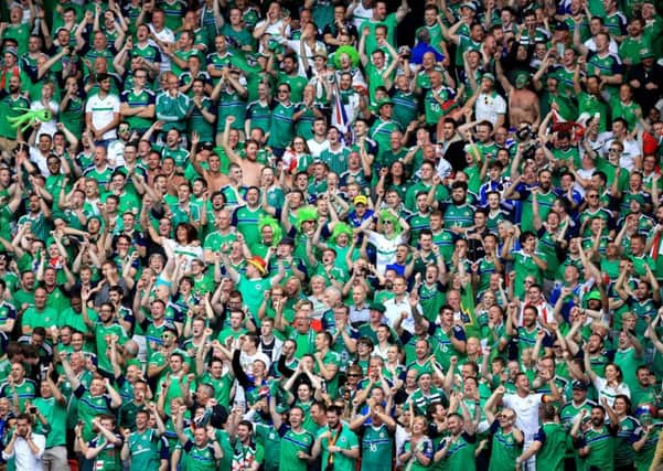 Northern Ireland fans cheer on their side in the stands during the UEFA Euro 2016, Group C match at the Parc Des Princes, Paris