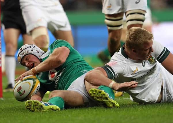Ireland's Luke Marshall scores a try
 against South Africa