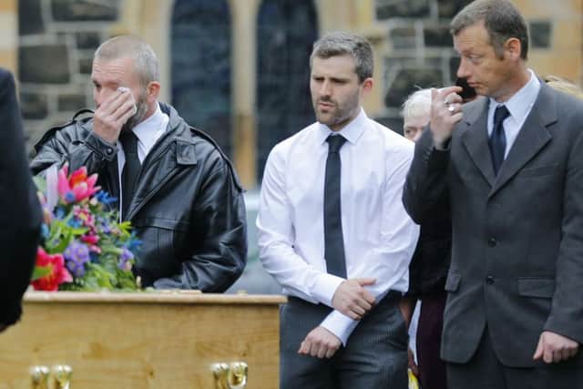 Wiping away the tears at Darren Rodgers' funeral service at St Patricks Church in Ballymena. ( Photo by Kevin Scott / Presseye)