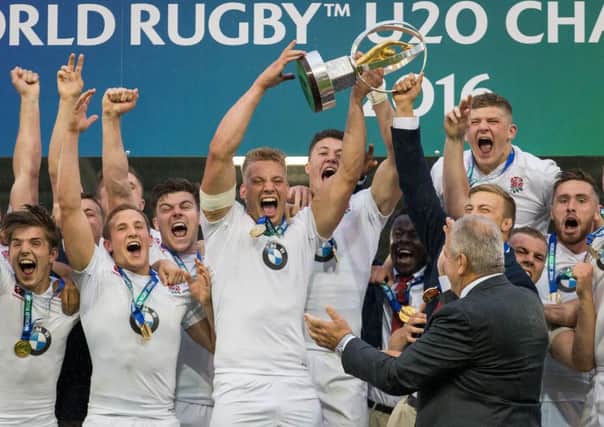 England's Harry Mallinder lifts The World Rugby U20 trophy after the win over Ireland in the final in Manchester