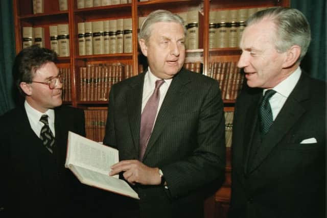 File photo dated 22/05/1996 of the then Sir Patrick Mayhew (centre) as he launches the new Bar Library Directory at Belfast High Court with Sir Brian Hutton, Lord Chief Justice (right) and Eugene Grant, Chairman General Council of the Bar