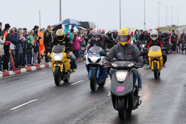Bikers set of on the tribute lap of the North West 200 course on Saturday in memory of Malachi Mitchell Thomas