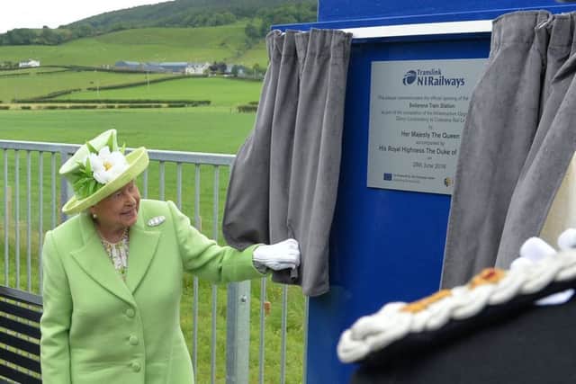 The Queen unveils the plaque marking the opening of the new rail platform at Bellarena