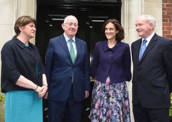 Northern Ireland Secretary Theresa Villiers met with Irish Foreign Affairs Minister Charlie Flanagan, First Minister Arlene Foster and Deputy First Minister Martin McGuinness for a review of the implementation of the Fresh Start agreement at Stormont House on Wednesday