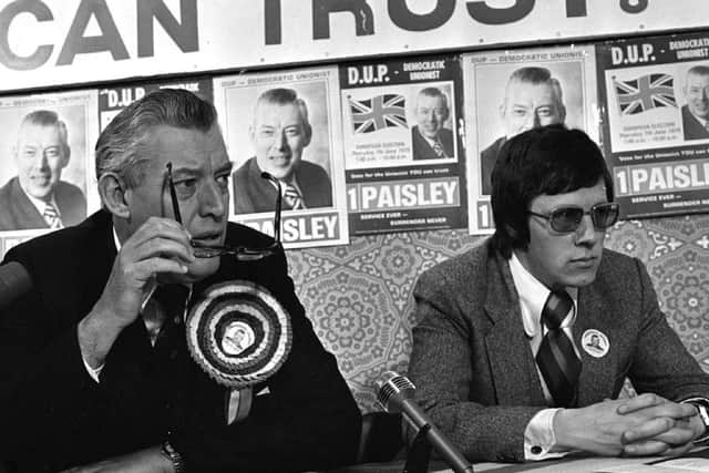 PACEMAKER PRESS INTL. BELFAST. Rev Ian Paisley announcing European Manefests at Party Headquarters. He is pictured with Peter Robinson. 23/5/79
105/79/bw
