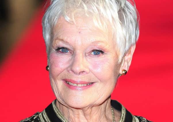 Dame Judi Dench who has been given an unusual 81st birthday present by her daughter - her first ever tattoo