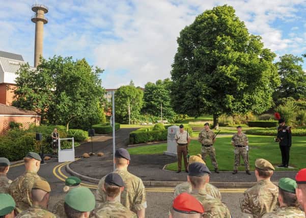 The sounding of Last Post by a bugler from 2 Rifles at the Somme Memorial in Thiepval Barracks, Lisburn which took place while an artillery round was fired by 206 (Ulster) Battery Royal Artillery at Hillsborough Castle.
